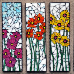 Five mosaic panels depict colorful flowers with green stems on a white background arranged in a row.