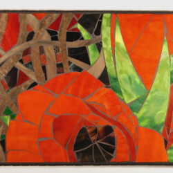 Stained glass artwork featuring abstract red flower shapes, green leaves, and brown branches on a dark background.