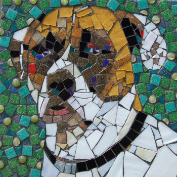 SOLD Mosaic artwork depicting a dog with a brown and white face against a green and blue tiled background.